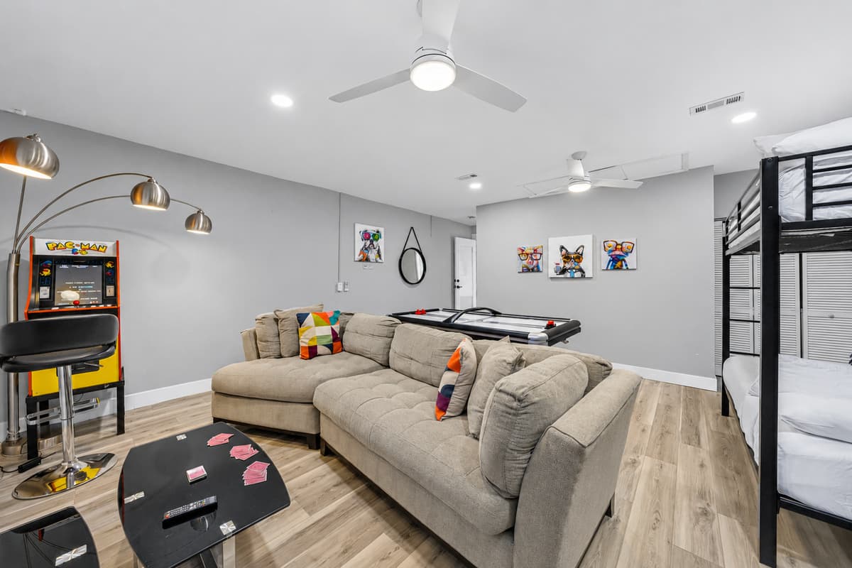 Challenge your group to air hockey before relaxing on the oversized sectional sofa.
