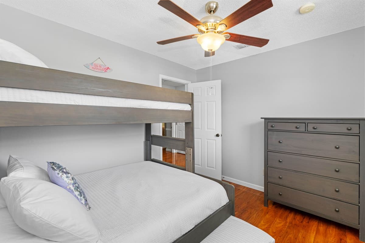 Twin XL over Queen bunk with Twin XL trundle — ideal for a small family or kids sharing a room.