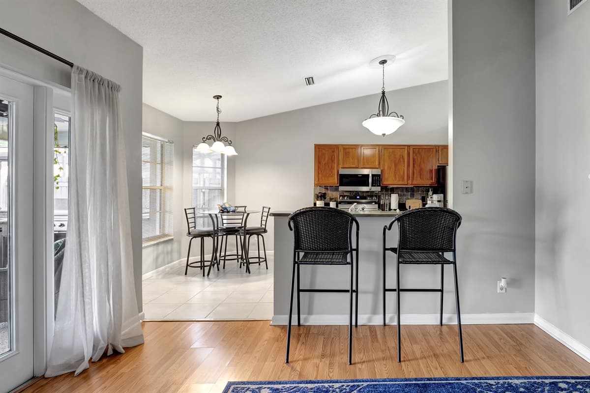 Savor the synergy of design and practicality as you dine in sophisticated comfort.