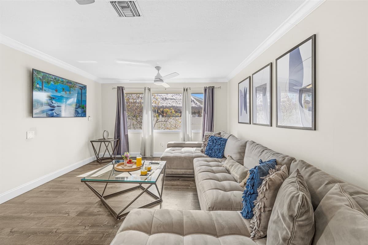 Unwind after a day of exploring in the spacious family room with plush sectional seating.