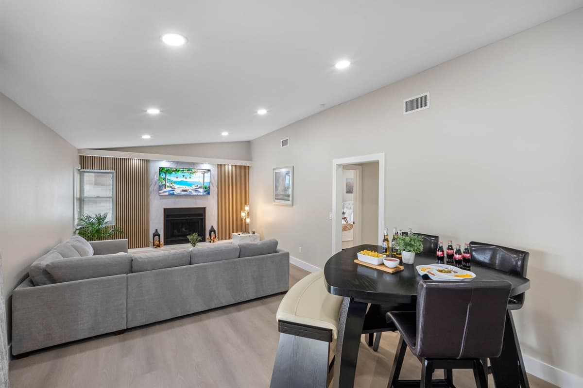 This stylish family room combines soft tones, elegant finishes, and natural light for a calm retreat.