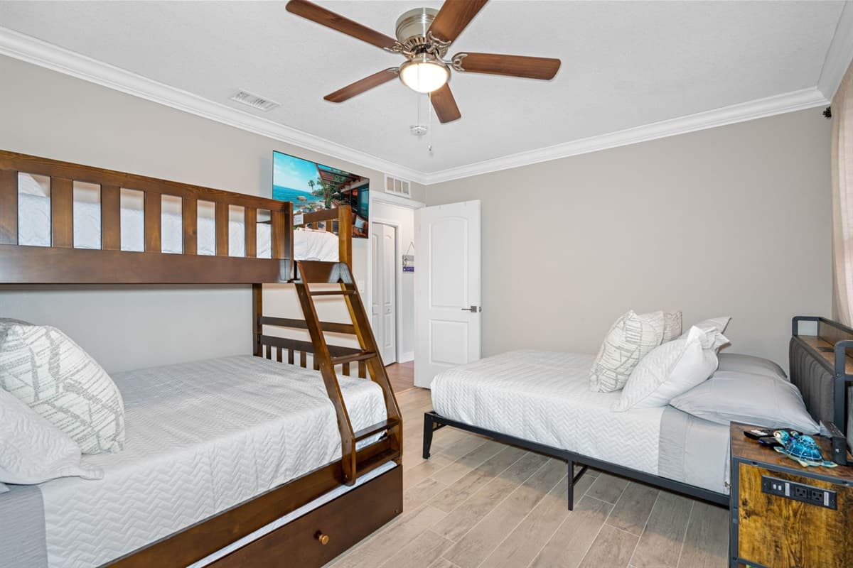 The room's decor is warm and welcoming, with gentle lighting and tasteful furnishings that create a cozy atmosphere.