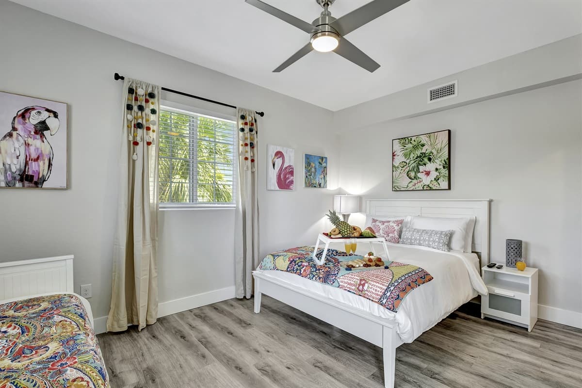 A realm of comfort and versatility, where the allure of both a queen and a twin-size bed await to cradle your dreams. 