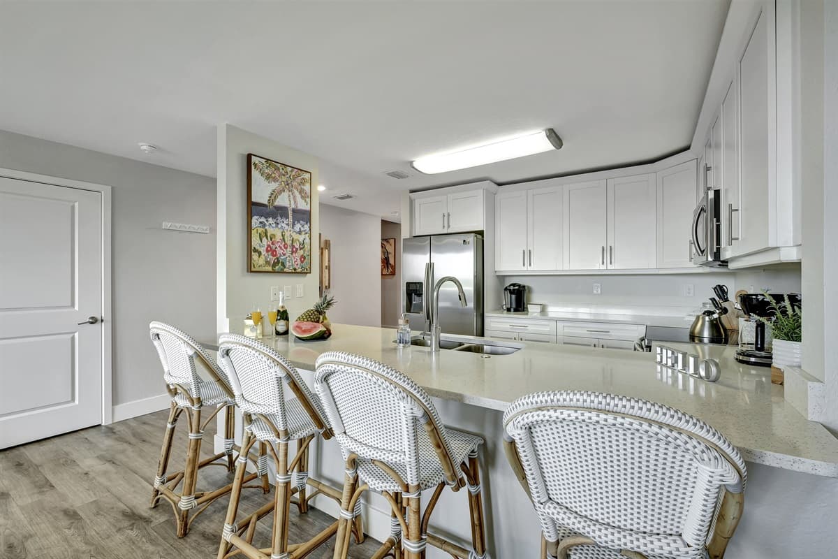 Bathed in the morning light filtering through nearby windows, this intimate space offers the perfect start to your day, a place where you can savor the simple pleasures of a homemade breakfast or share laughter with loved ones.