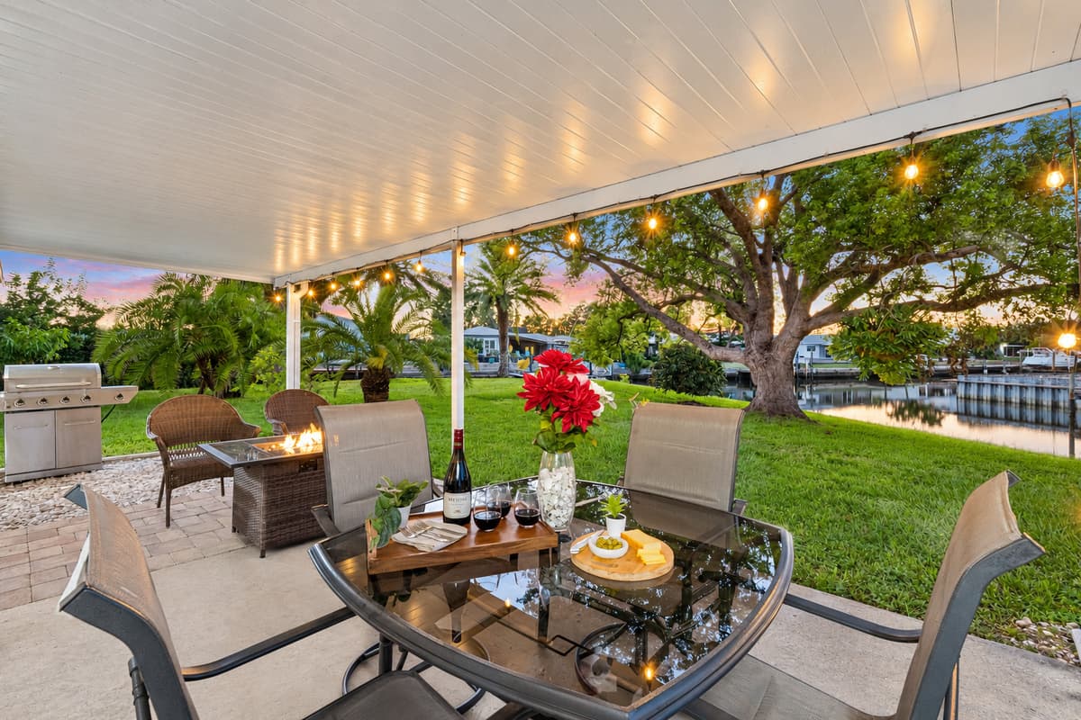 Unwind in the evening with a beautifully lit waterfront patio, designed for unforgettable nights outdoors.