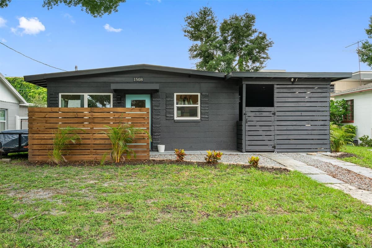The exterior paint scheme is thoughtfully chosen to enhance the architectural details.