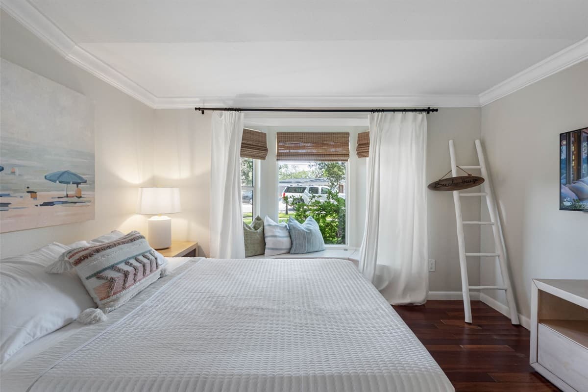 Bright and airy space with large windows, filling the room with natural light.