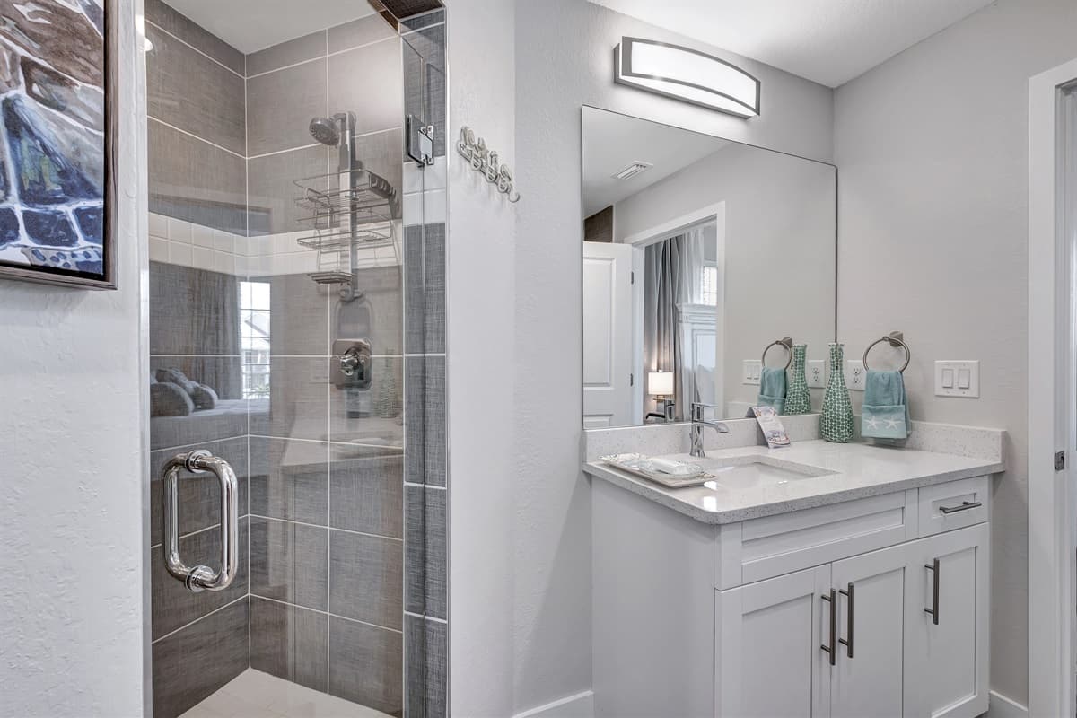 The sleek walk-in shower, in contemporary design, inviting you to cleanse and rejuvenate under a cascade of invigorating water. 