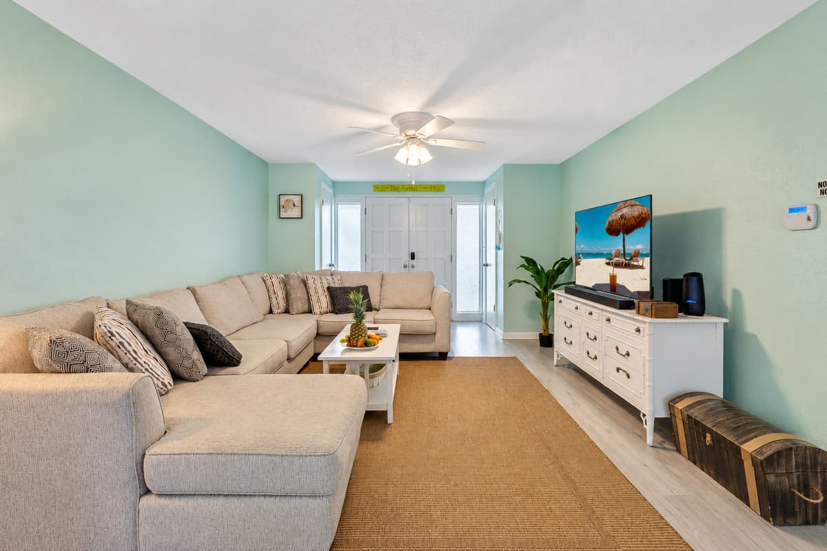 The color palette, dominated by soothing grey tones, adds a touch of sophistication while maintaining a cozy and welcoming feel.