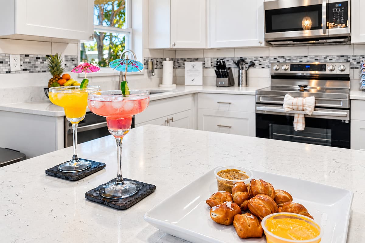 Bright, modern kitchen with quartz countertops—perfect for preparing meals and entertaining.
