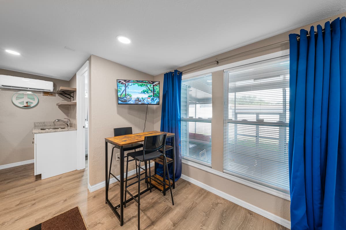 Bright and inviting living room with plush sectional seating, stylish décor, and plenty of space to relax. — photo 53
