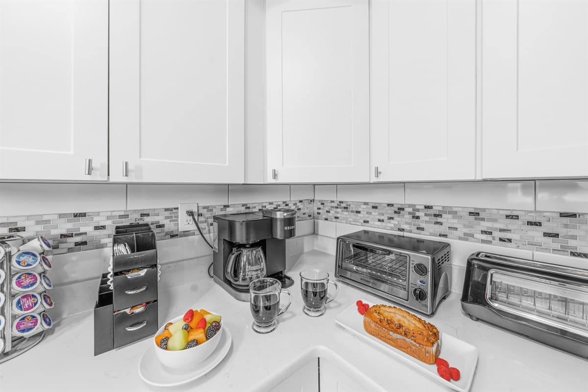 Coffee station complete with a Keurig, toaster, and essentials for a great start to your day.