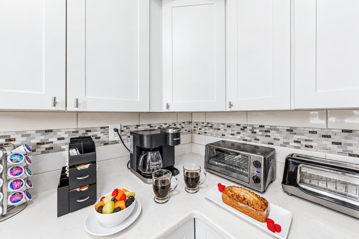 Coffee station complete with a Keurig, toaster, and essentials for a great start to your day.