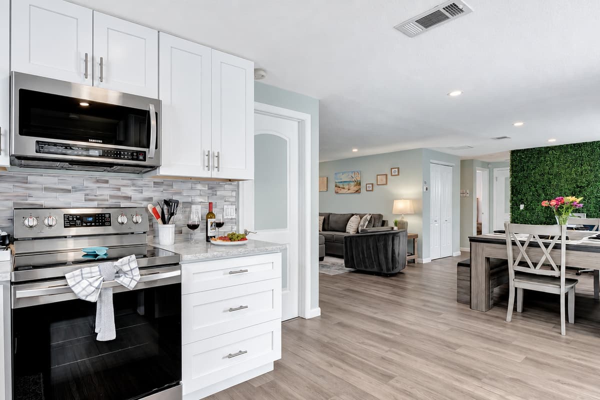 Our stunning kitchen, a masterpiece of clean, sleek design.