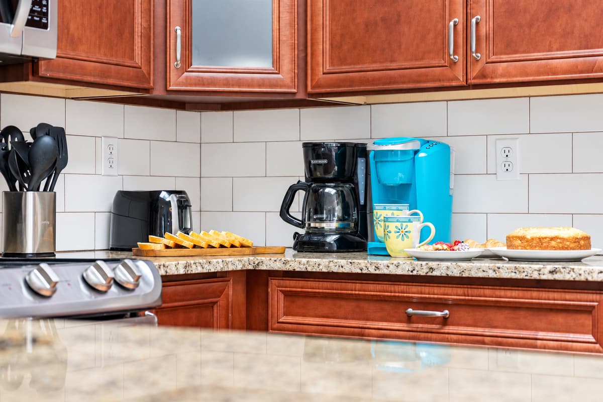 The kitchen is thoughtfully designed to offer everything you need to prepare and enjoy delicious home-cooked meals during your stay.