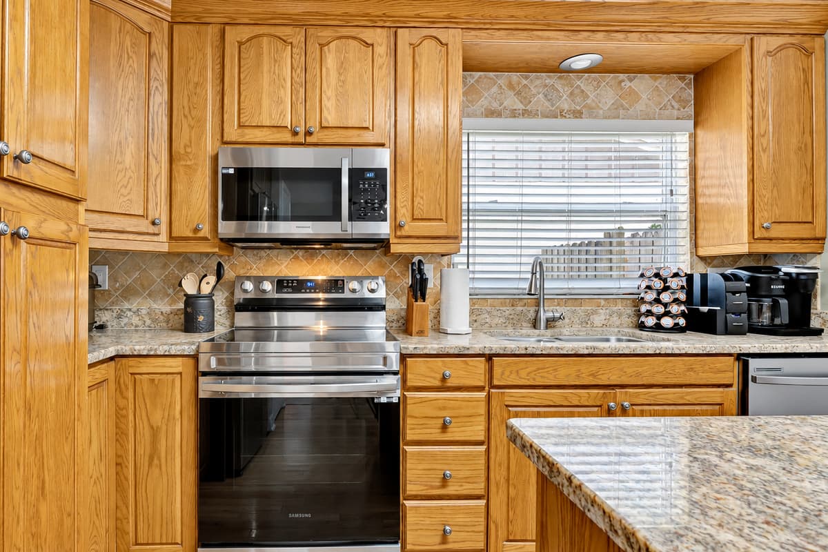 Our kitchen is crafted with solid wooden cabinets, this culinary haven exudes warmth and sophistication.