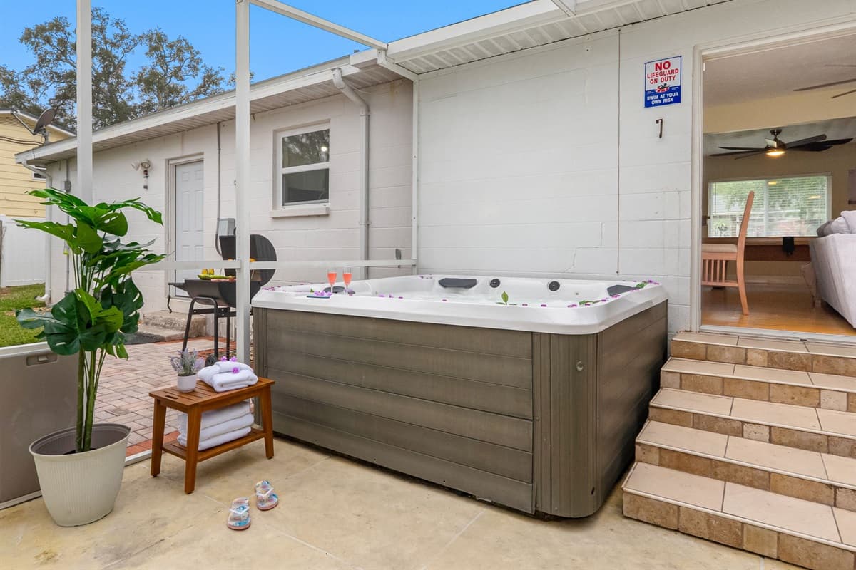 Enjoy a spa-like experience in this spacious hot tub located on the screened patio.