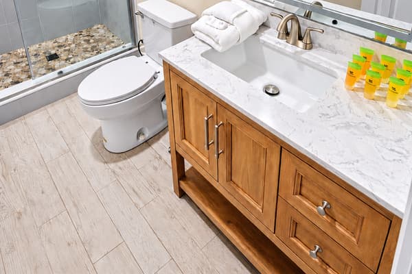 The soothing tones and clean finishes offer a relaxing retreat after a long day.