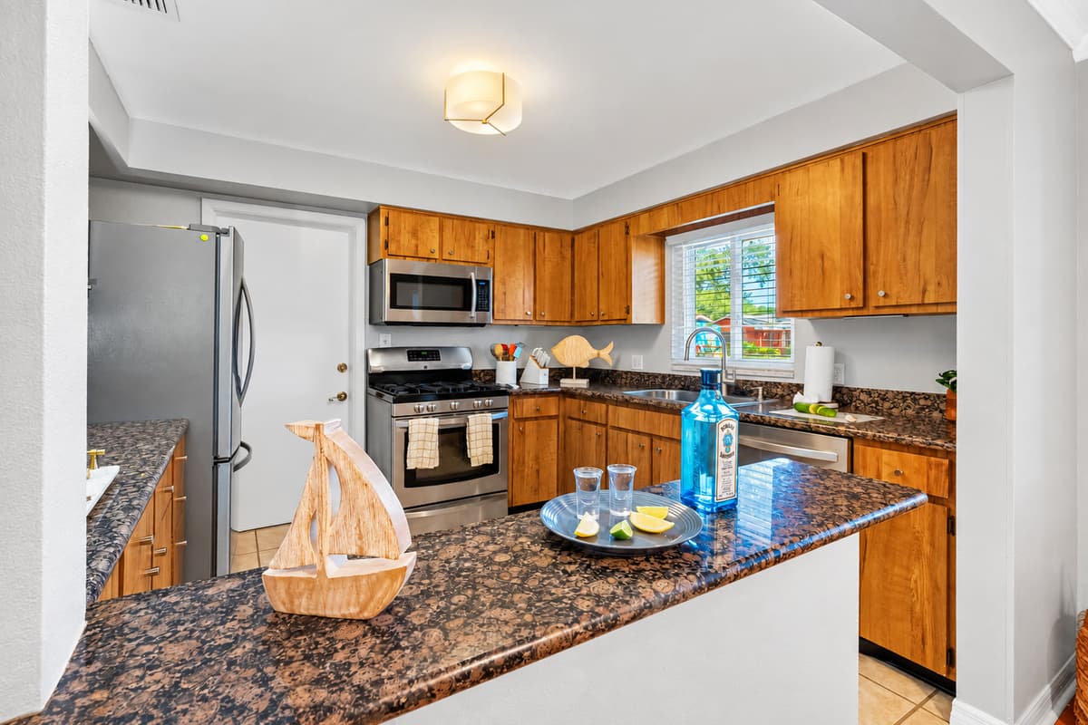 Cook like a local in this fully equipped kitchen with stainless steel appliances and plenty of prep space.