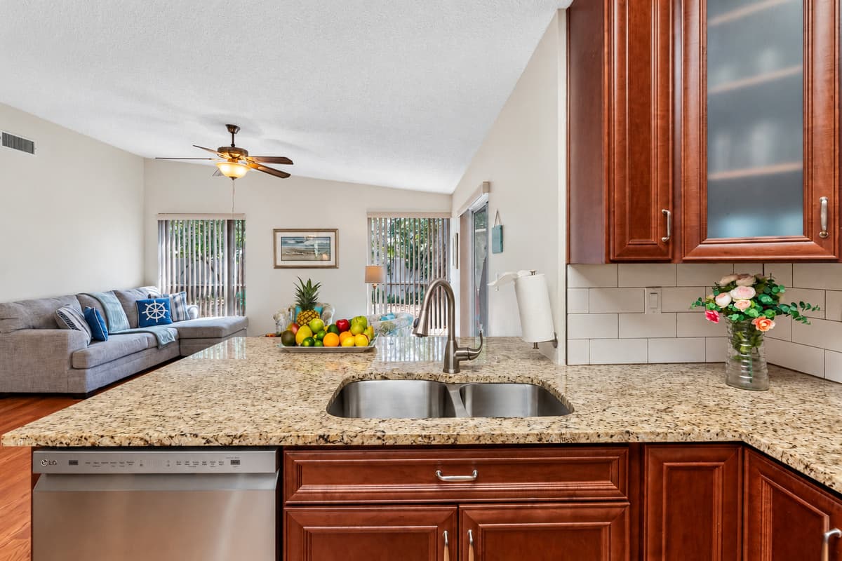 You'll find modern, full-sized appliances, including a refrigerator with freezer, a smooth-top stove and oven, a built-in microwave, and a dishwasher for easy clean-up after meals.