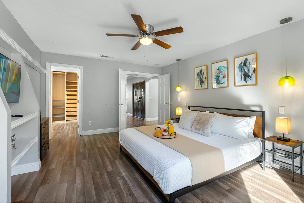 Relax in this bright master suite featuring a king-size bed, ensuite bath, and modern comforts.
