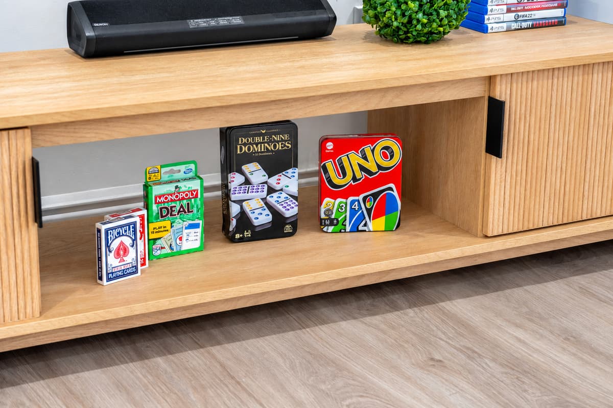 From fast-paced video games to laid-back board games, this home is stocked for both digital and analog fun.