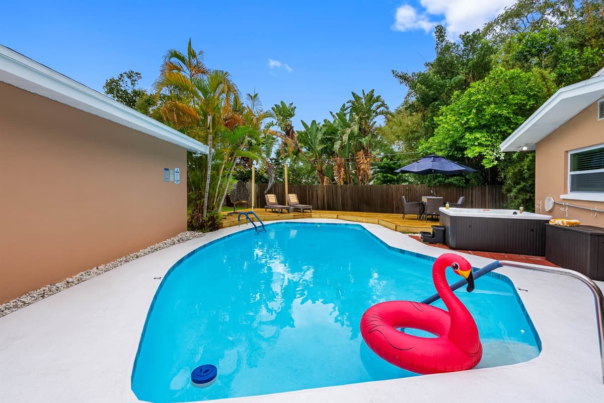 A kid-friendly pool, plenty of deck space, and outdoor games make this the ultimate family hangout.