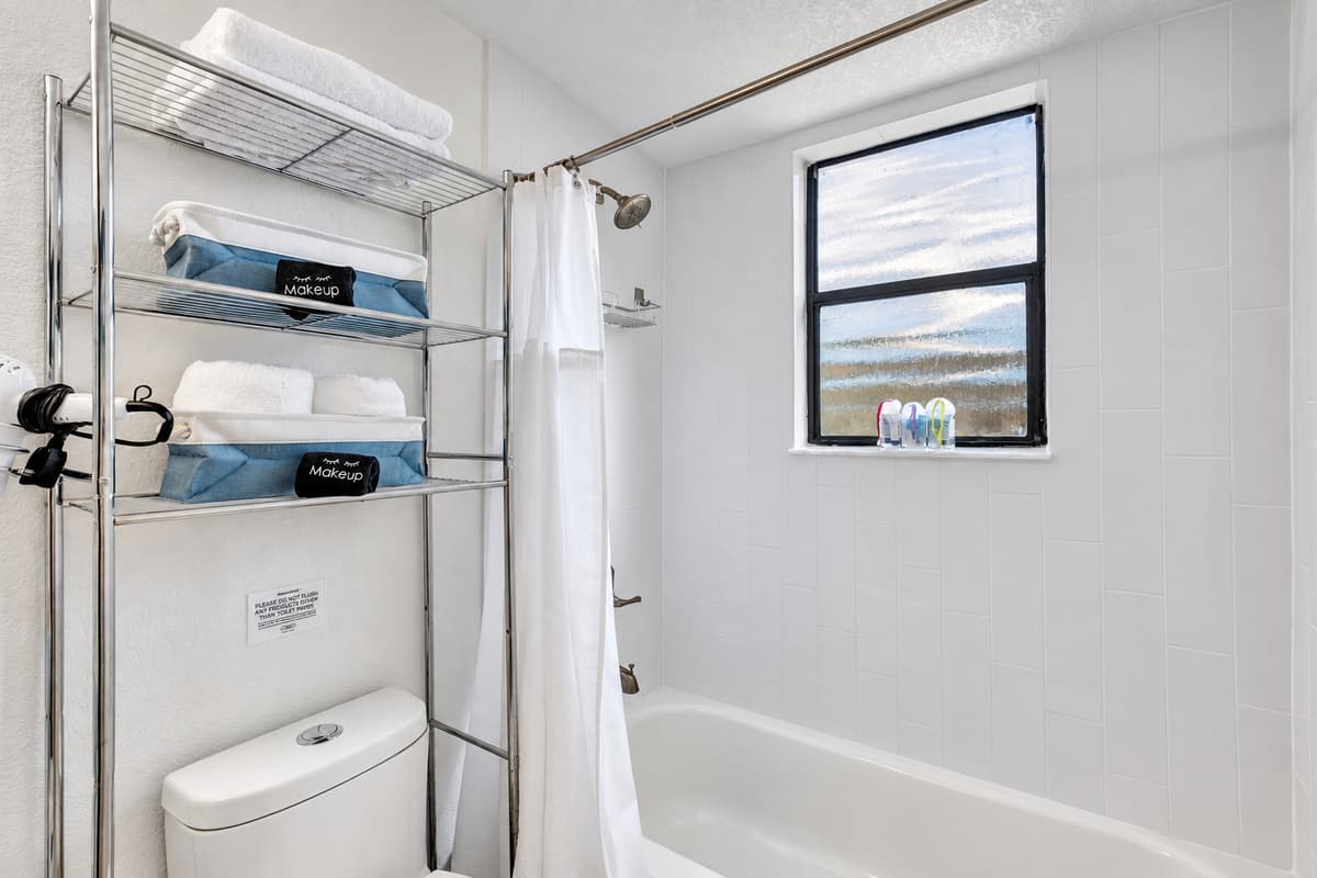The bathroom is also equipped with premium bath products, adding a touch of indulgence to your stay.