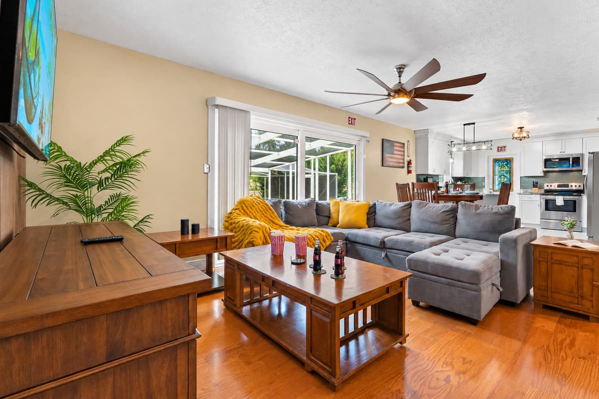 Spacious and inviting living room with plush seating, perfect for relaxing or gathering with family and friends.