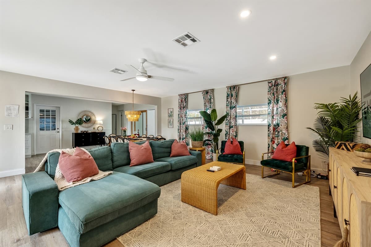 The interior design is a masterpiece of tropical chic, blending modern elegance with island-inspired elements.