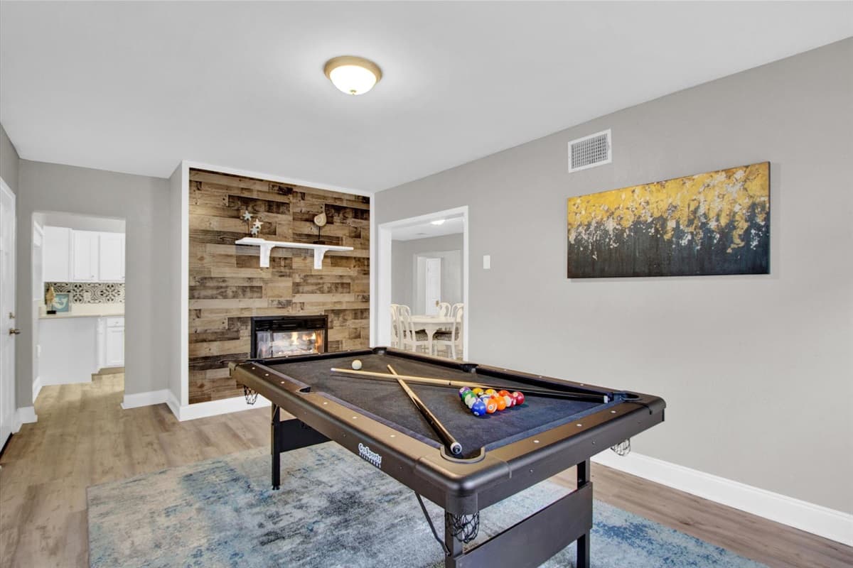 Our sleek pool table, inviting you to cue up for a friendly match or showcase your trick shot prowess.