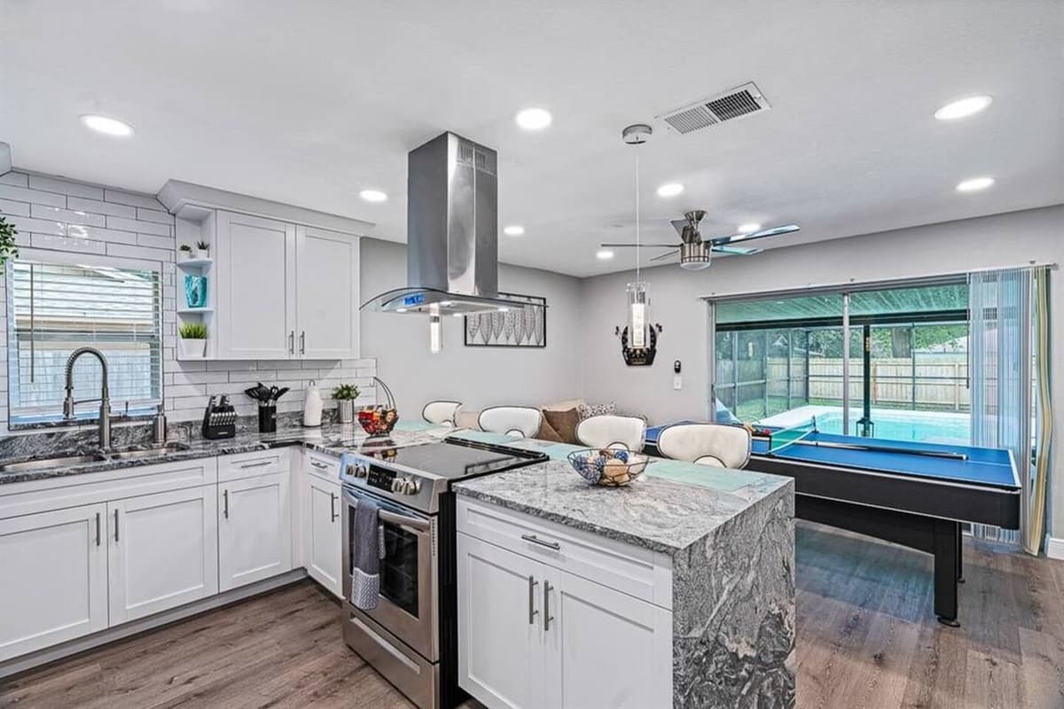 Cook your favorite meals in our amazing fully equipped kitchen! Never worry about the kids swimming in our gorgeous heated pool because you could check on them from the kitchen while you are cooking. Send us an inquiry now!