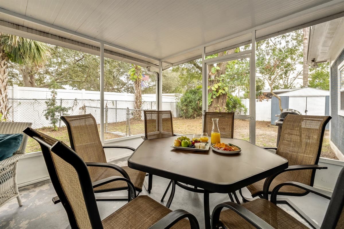 A haven for all seasons, where stylish seating arrangements redefine the meaning of comfort in a beautiful setting.