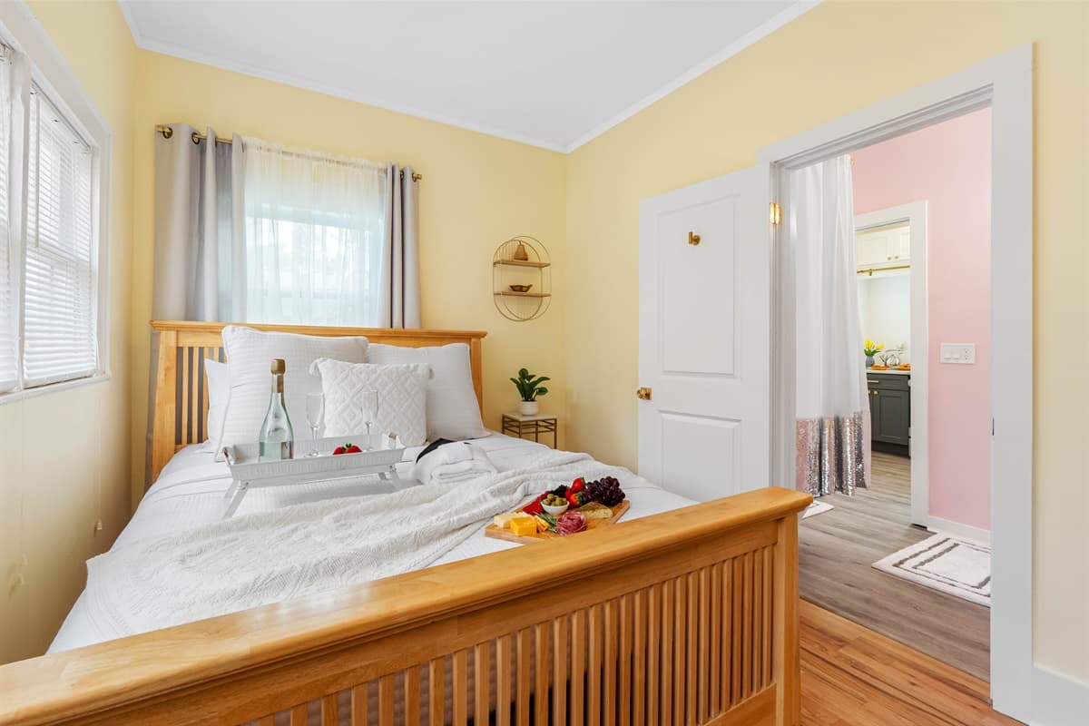 One of the standout features of this room is the attached Jack-and-Jill bathroom, which provides added privacy and ease of access.