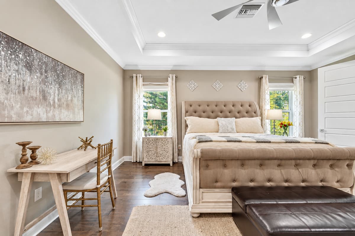 The king-size bed takes center stage in this bedroom, offering a comfortable haven where guests can sink into a state of relaxation.