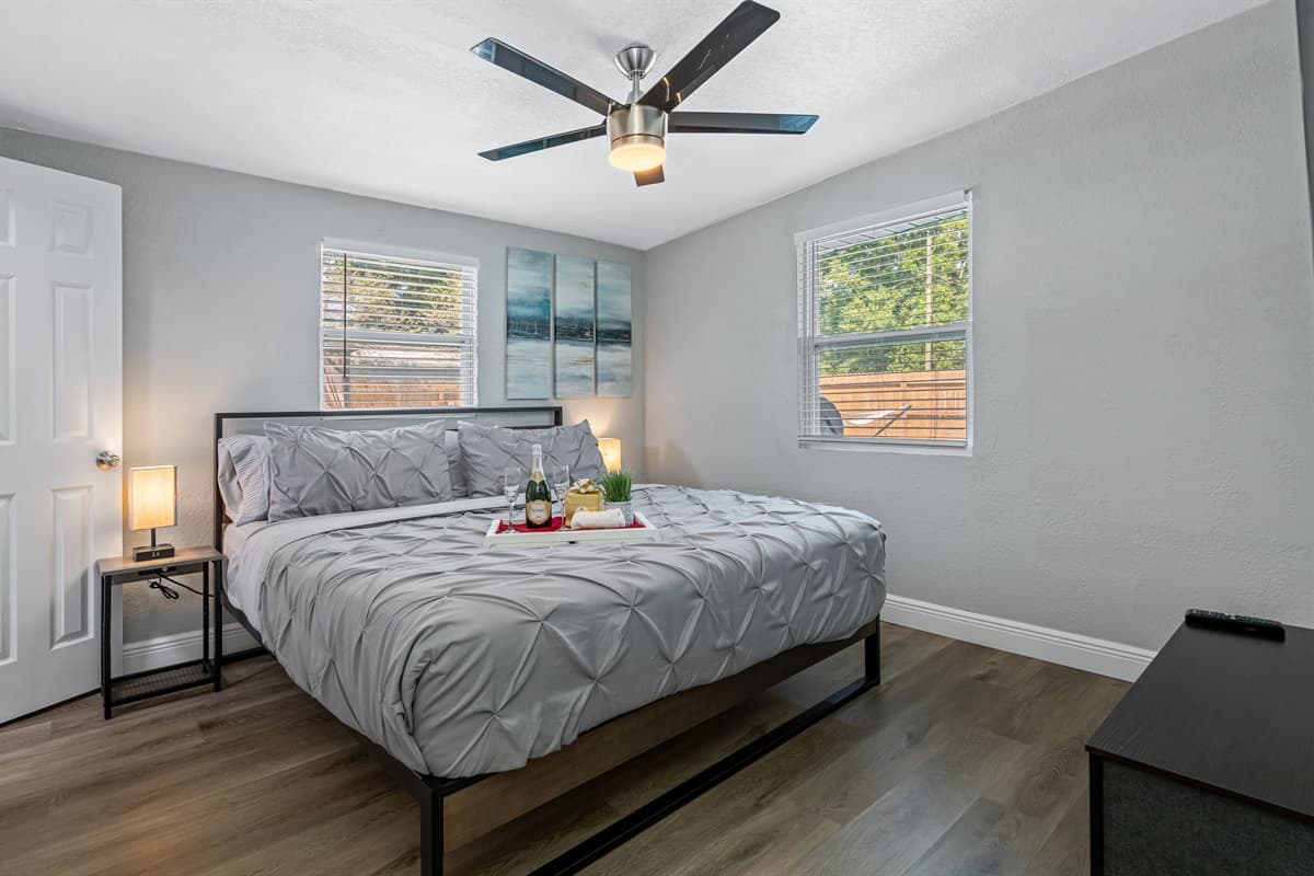 Welcome to the serene and elegant bedroom, where every detail has been carefully curated to ensure a peaceful and restful stay.