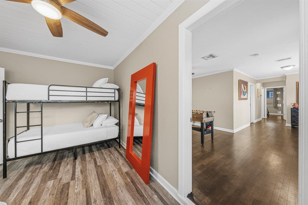 Open sleeping area with bunk beds and easy access to main living spaces—great for groups.