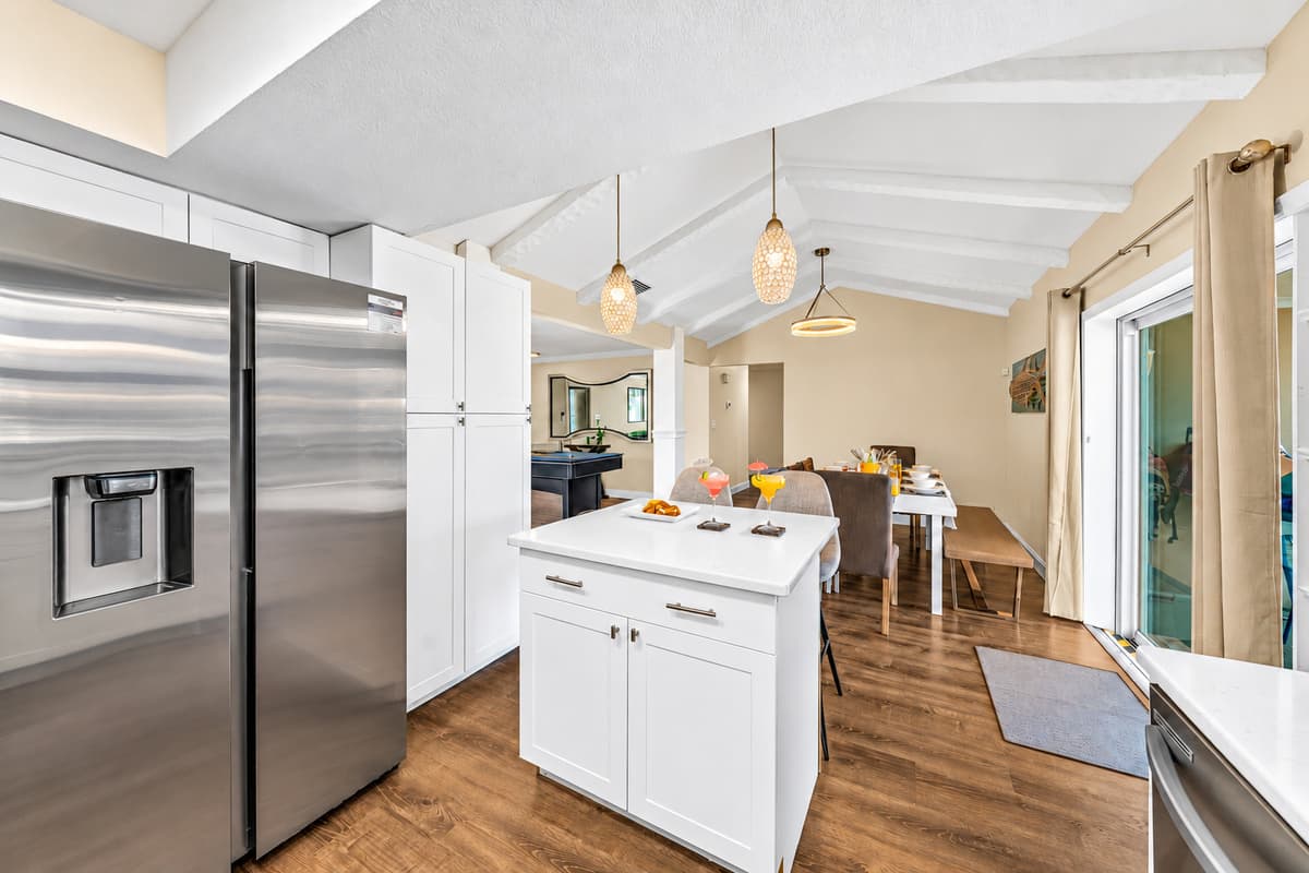 Bright and airy kitchen with a large island, perfect for family meals and entertaining.