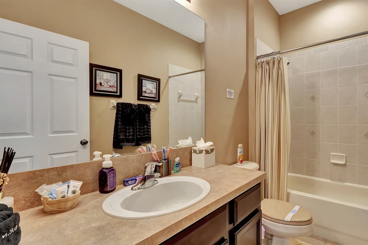 Exquisite countertops, ample storage, and beautifully crafted mirrors invite you to pamper yourself with ease.