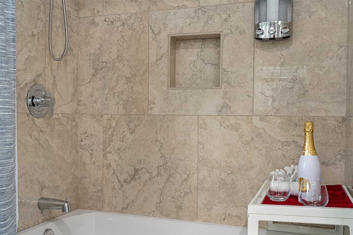 Immerse yourself in a soothing bubble bath to unwind after a long day, or enjoy a refreshing shower to invigorate your senses.