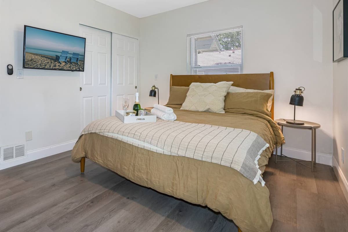 Who wouldn't love this elegant room with queen sized bed, spacious closet, vanity, and its own smart TV! If you like what you see, send us a message now!