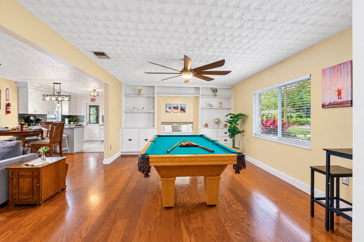 Perfect for game nights, this spacious entertainment area is ideal for all ages.