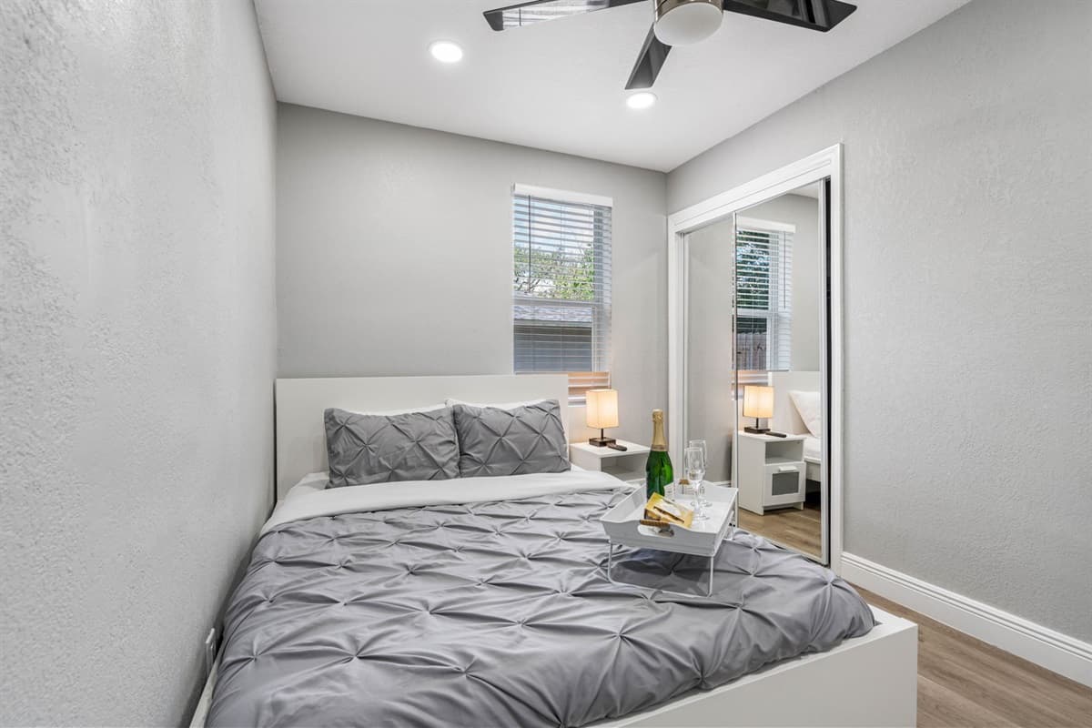 The room features elegant decor, blending modern luxury with a cozy ambiance.