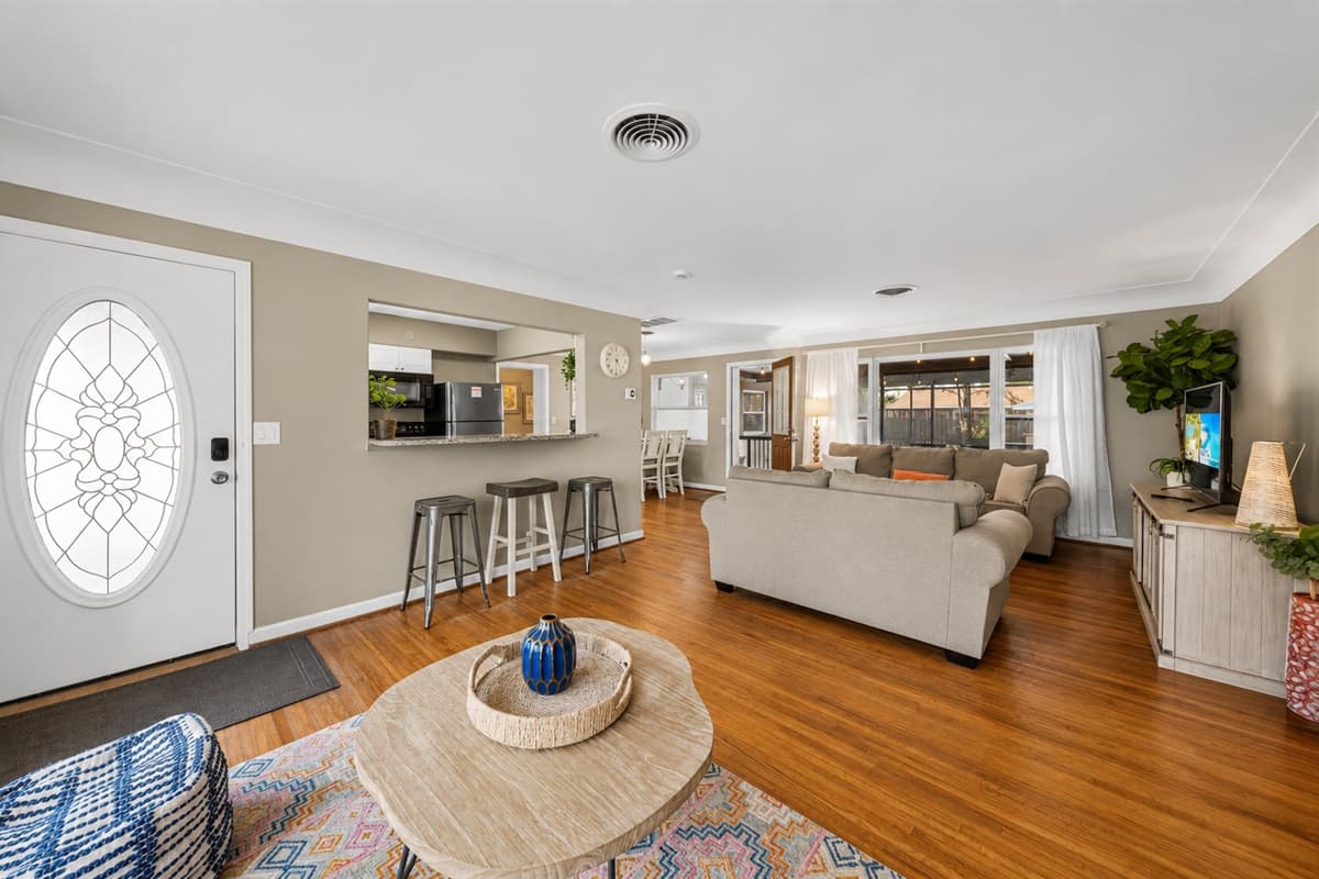 Beautifully designed open-concept interior with stylish furnishings and abundant natural light.