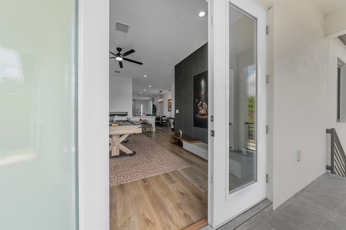 Entryway and transition space connecting to the main living area, offering a clean and modern first impression.