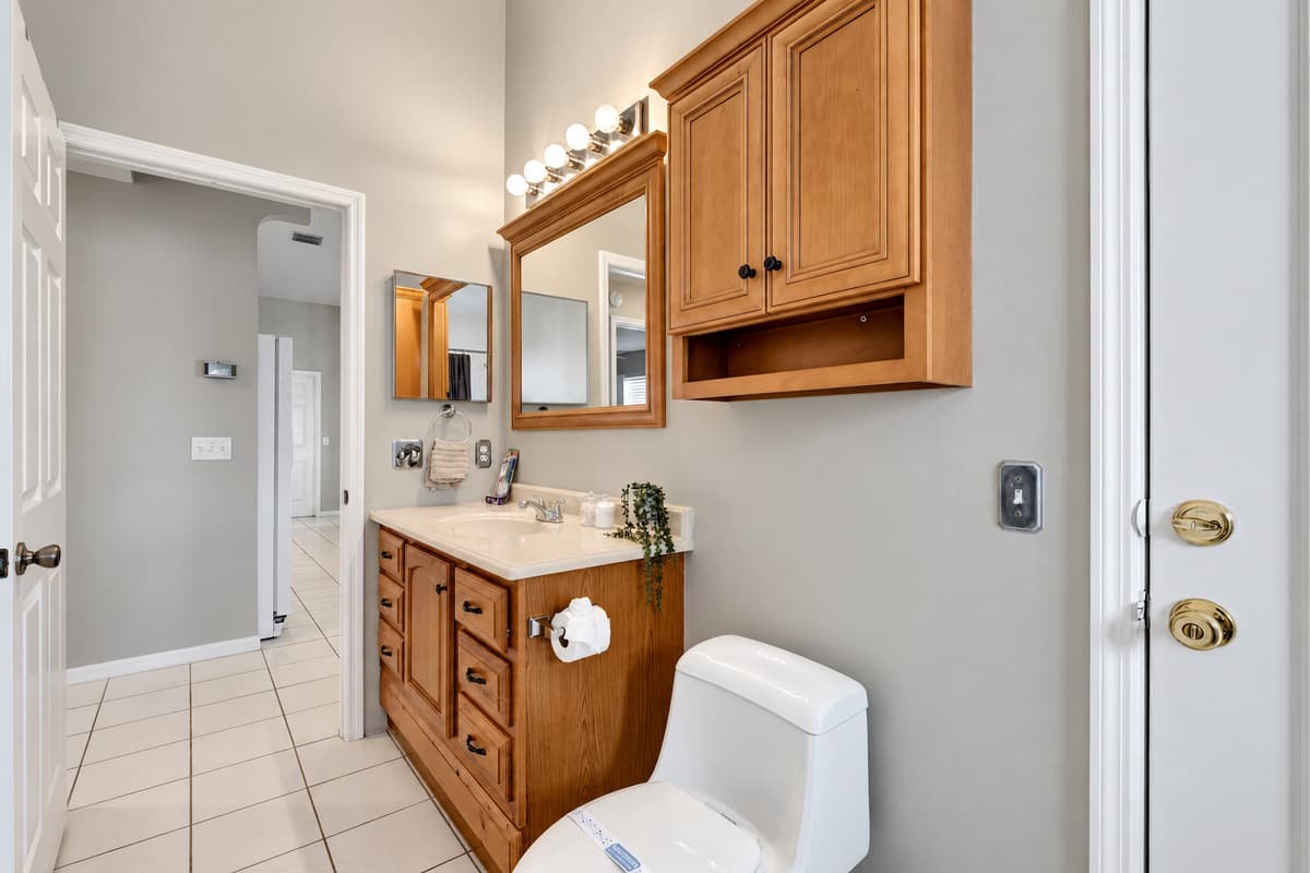 As you step into our enticing bathroom, you are enveloped in an atmosphere of tranquility and luxury.