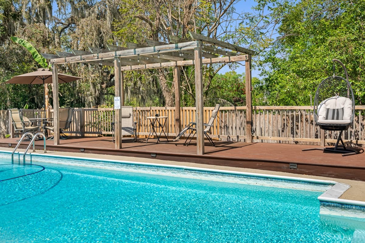 The water is refreshing and pristine, perfect for swimming, lounging, or simply soaking up the sun.