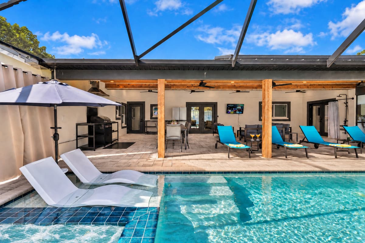 Umbrella up, lounger claimed, and the water two feet from your hand.