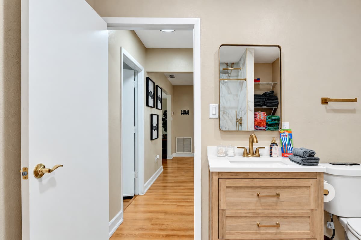 Elevate your stay with a touch of grandeur in our sumptuous bathroom oasis.