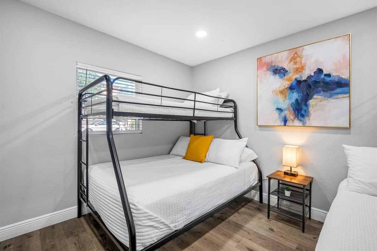 With two sturdy bunk beds and plush bedding, this room is perfect for friends or families traveling together.